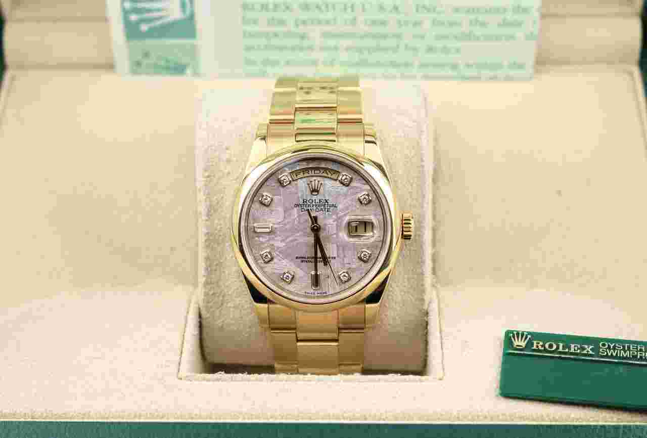 Rolex Day-Date 36
2003 Day-Date 118208 Meteorite Serti Diam Dial 18kt Oyster With paper 36mm