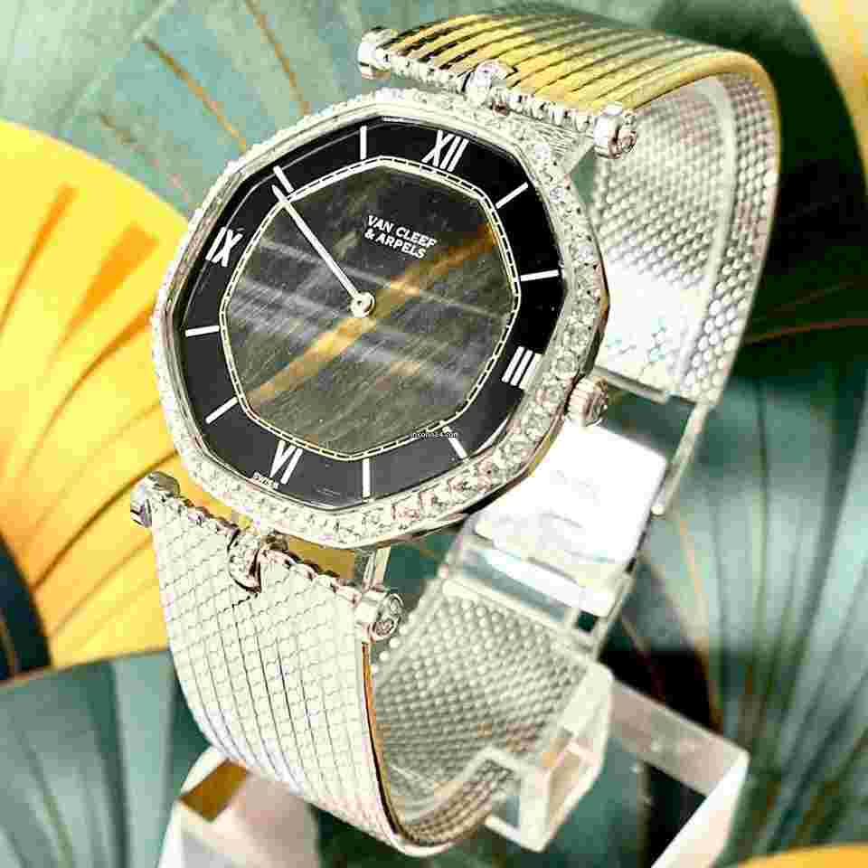 Van Cleef & Arpels
Vintage 18K White Gold Tiger's Eye Quartz Dial and Diamond Bezel Automatic VCA