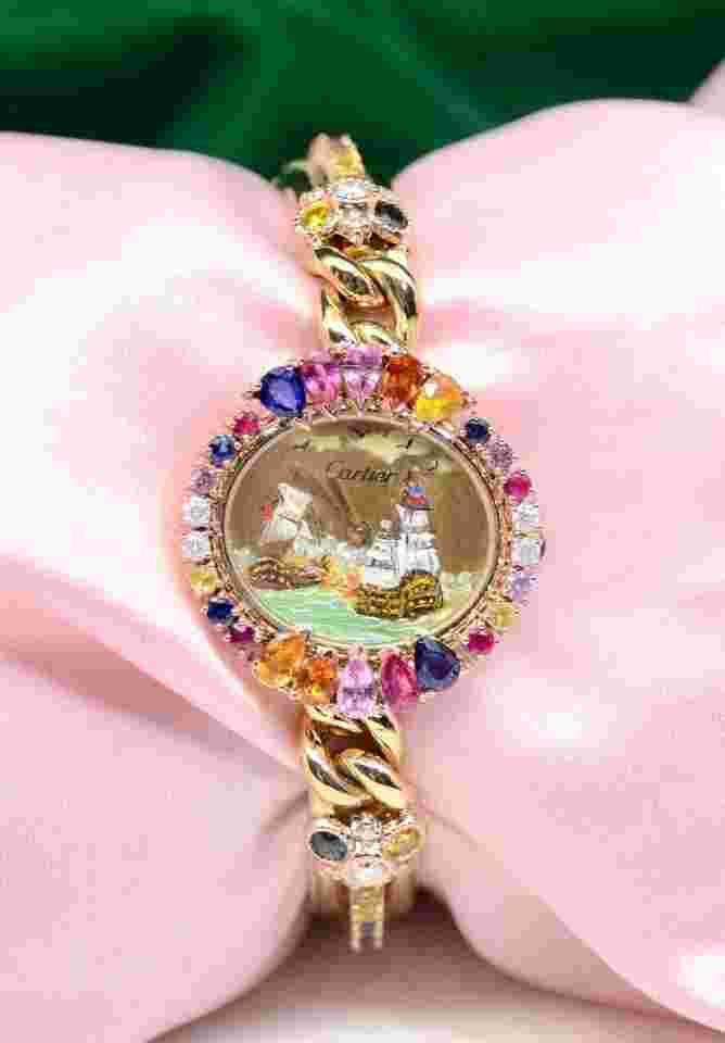 Cartier
Rare Vintage Women Cartier 18K Yellow Gold watch w/Diamonds Rubies Sapphires