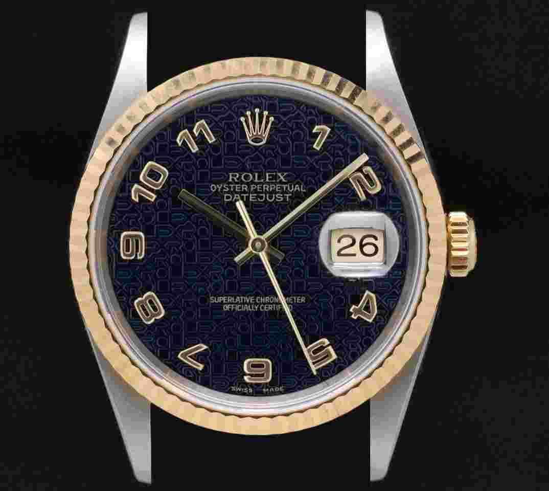 Rolex Datejust 36
16233 DATEJUST 2-TONE BLACK JUBILEE DIAL W PAPER