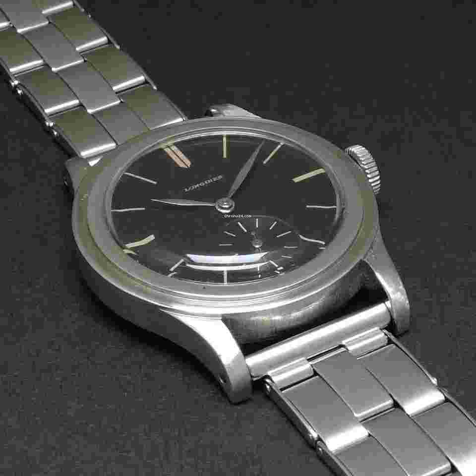 Longines
"Tre-Tacche" 35mm Rare Black gilt dial with Bar-indexes design