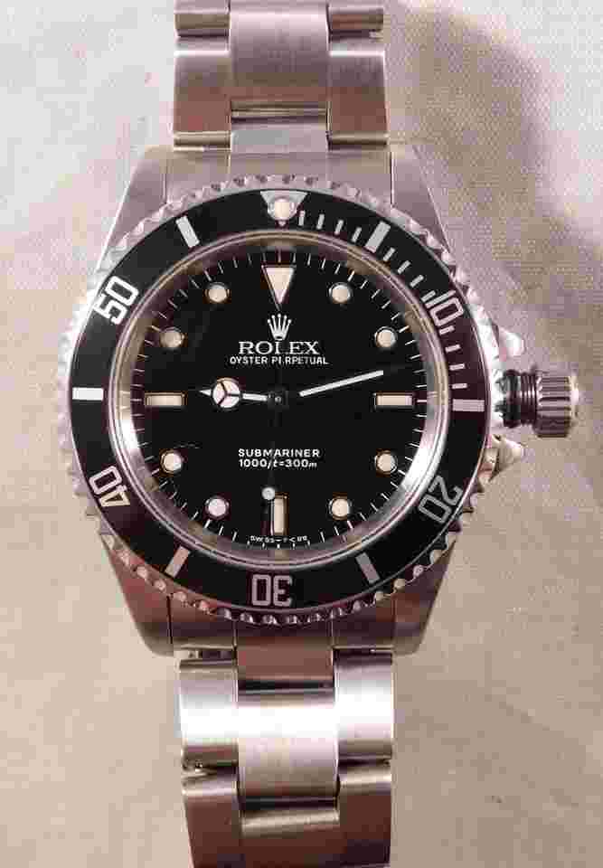 Rolex Submariner (No Date)
14060 SS Black Dial Vintage 1990 Mens Watch....40mm