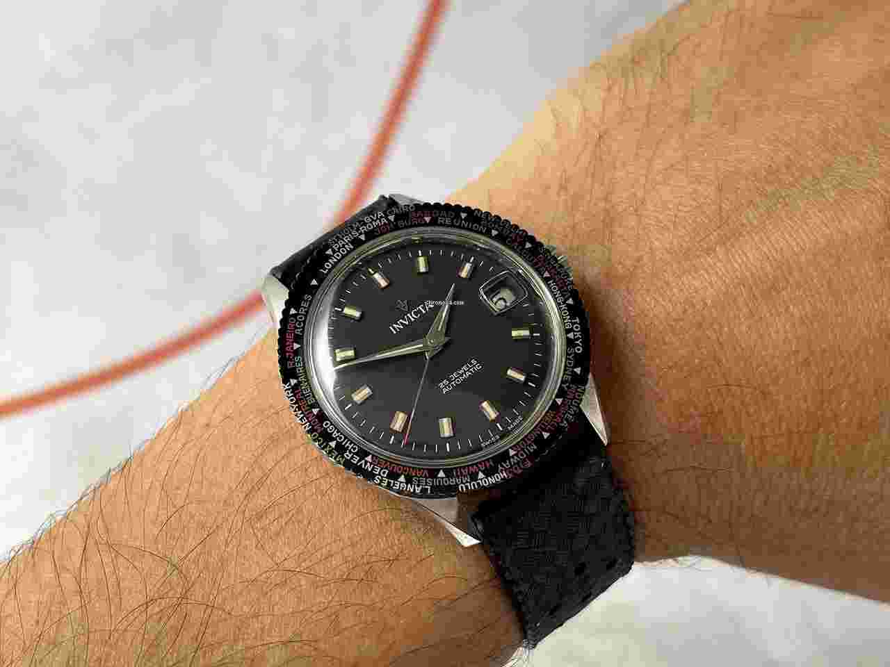 Invicta
                           
                                 N.O.S. INVICTA WORLD TIME Vintage Swiss automatic watch Cal. FHF 90-5 DIVER Ref. 27177 OVERSIZE