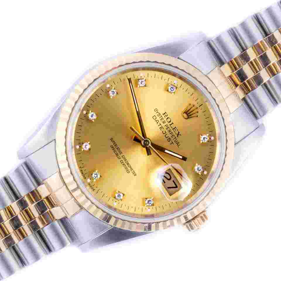 Rolex Datejust 36
Champagne Diamond 16233 1990 (Full Set)