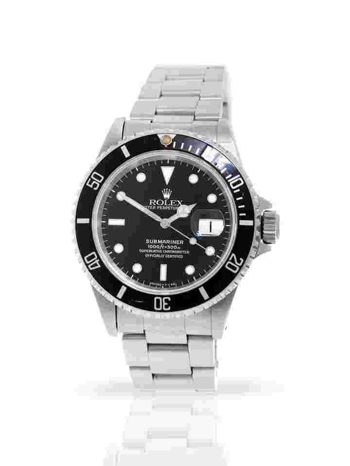 Rolex Submariner Date
16610 - Box & Papers - 24-Month Warranty - 1996