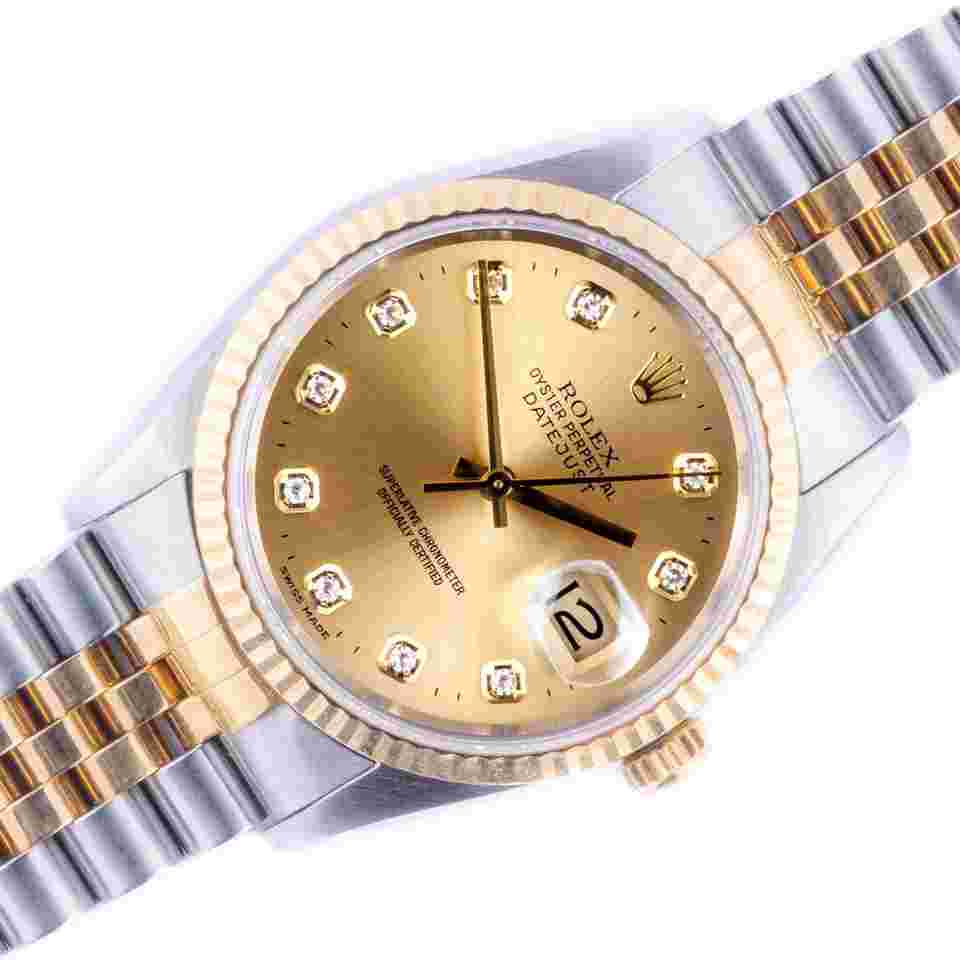 Rolex Datejust 36
Oyster Perpetual Datejust Champagne Diamond 16233 1995