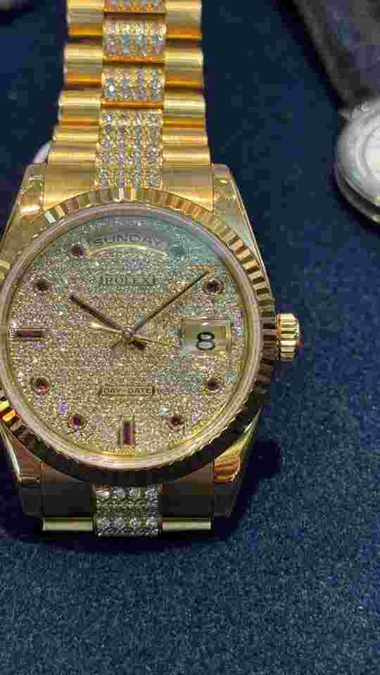 Rolex Day-Date 36
Oyster Perpetual Day-Date 118238 All Factory Original Pave Dial w Ruby indexes & bracelet